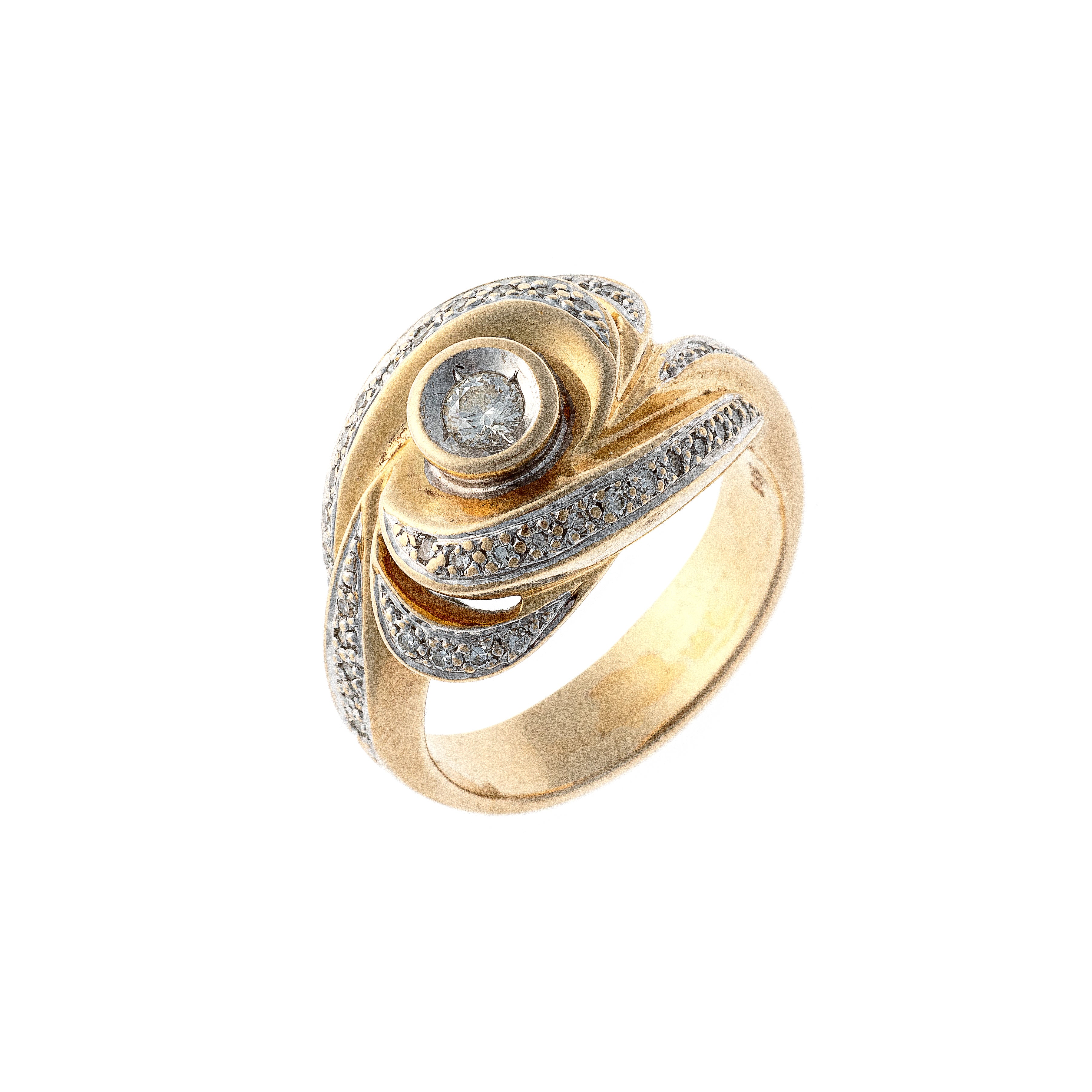 Contemporary vintage two-tone gold diamond swirl cocktail ring.