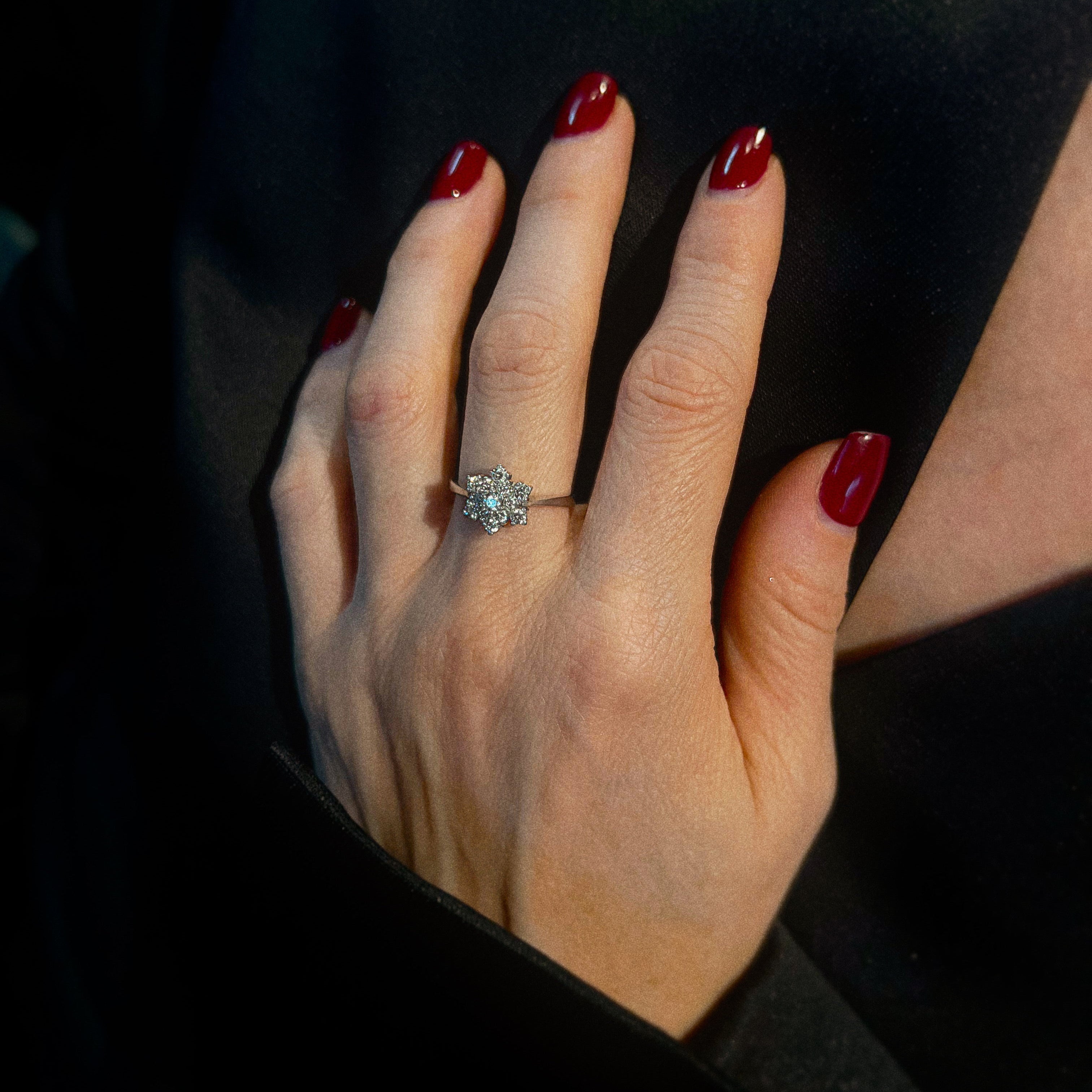 Model wearing the vintage white gold floral diamond cluster ring.