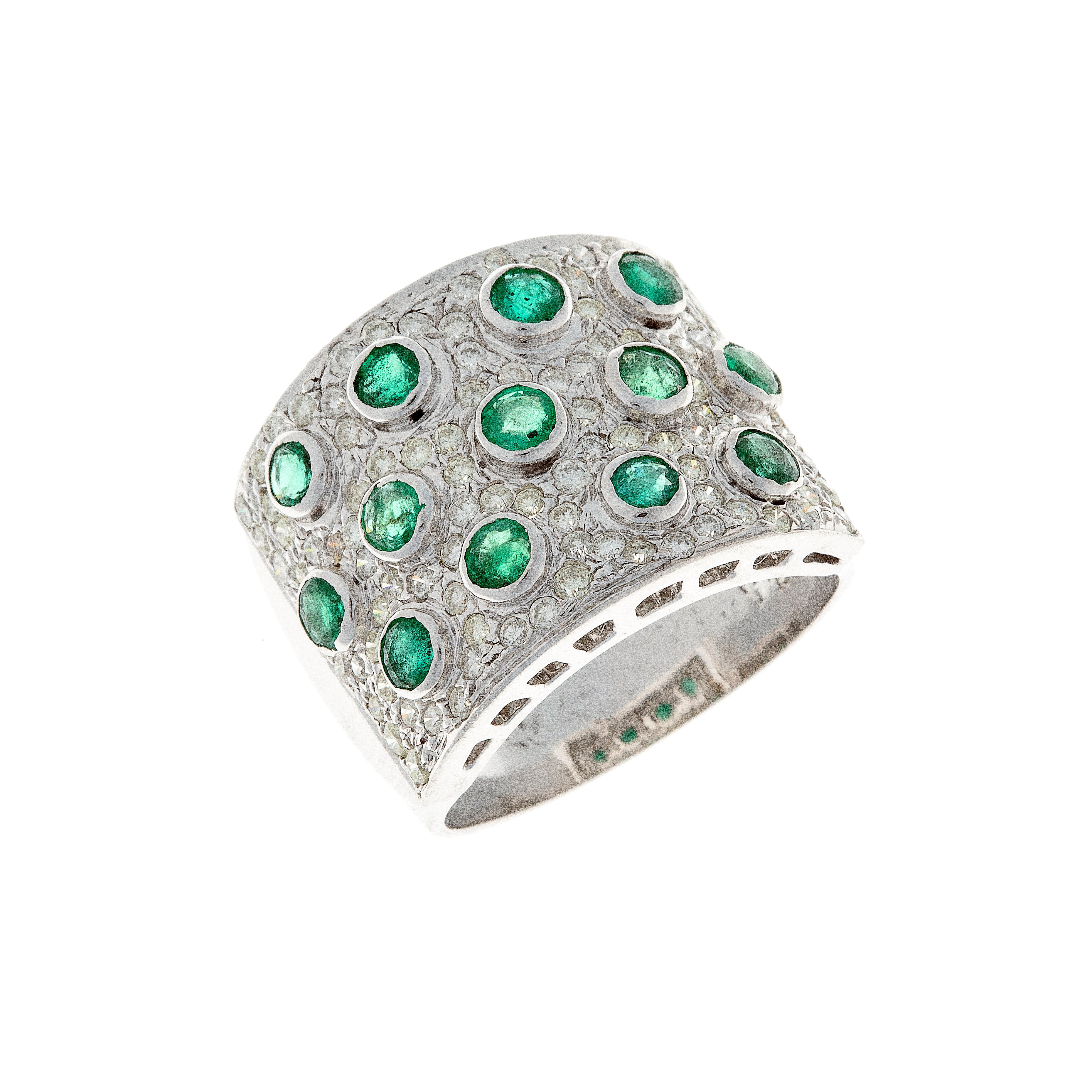 Angled view showing emerald and diamond arrangement on wide contemporary vintage ring.