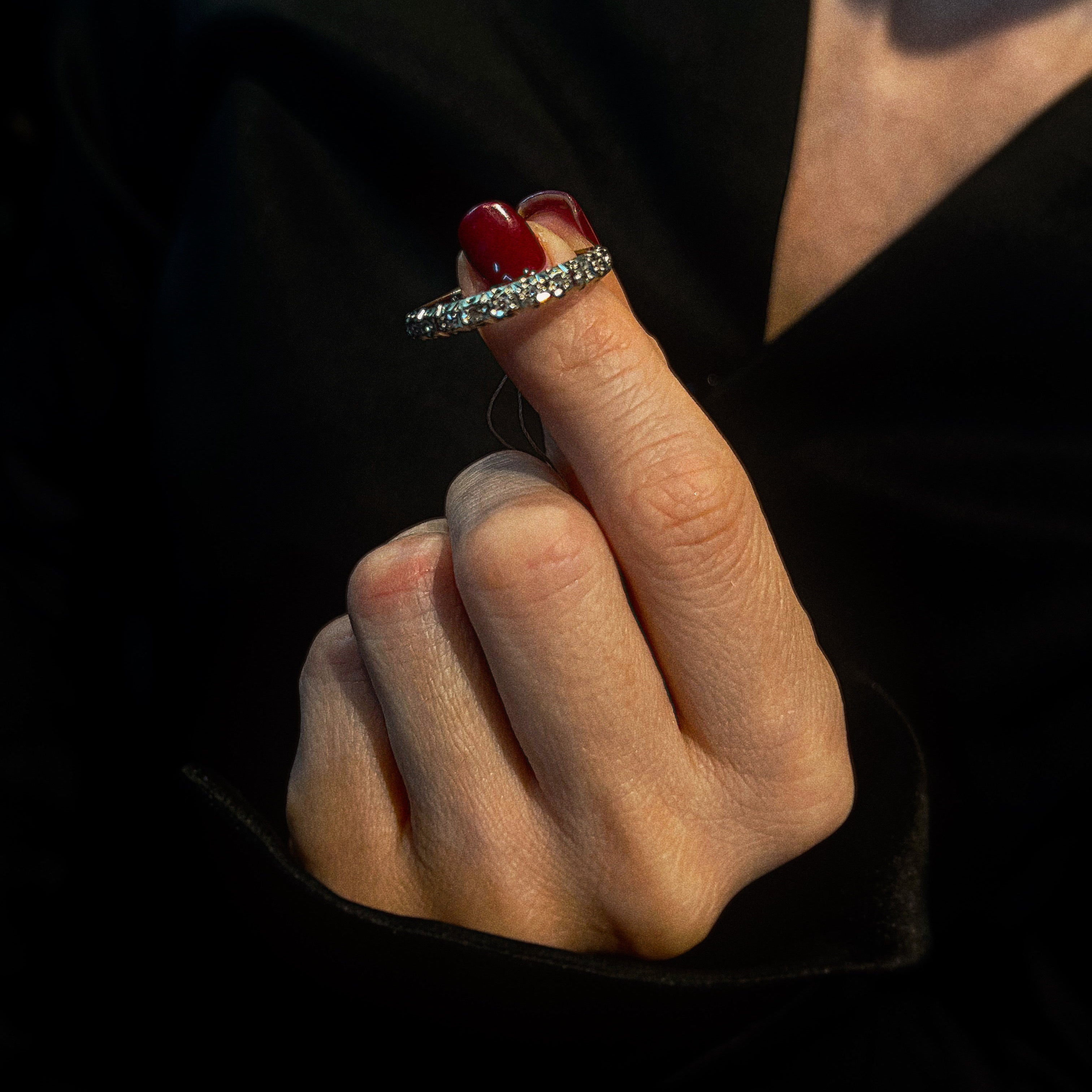 Model wearing the vintage white gold eternity diamond ring.