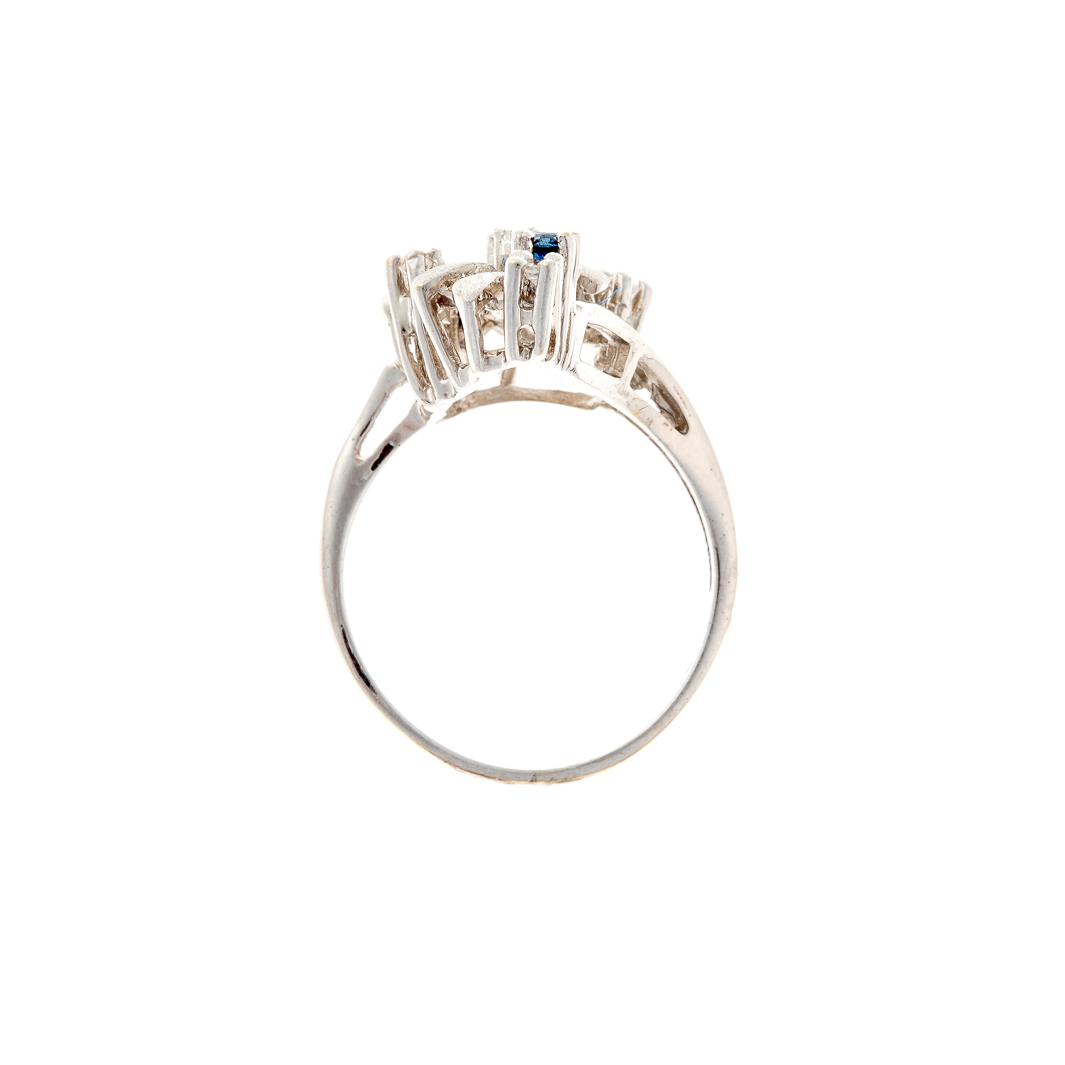 Profile of the white gold floral vintage ring with sapphires and diamonds.