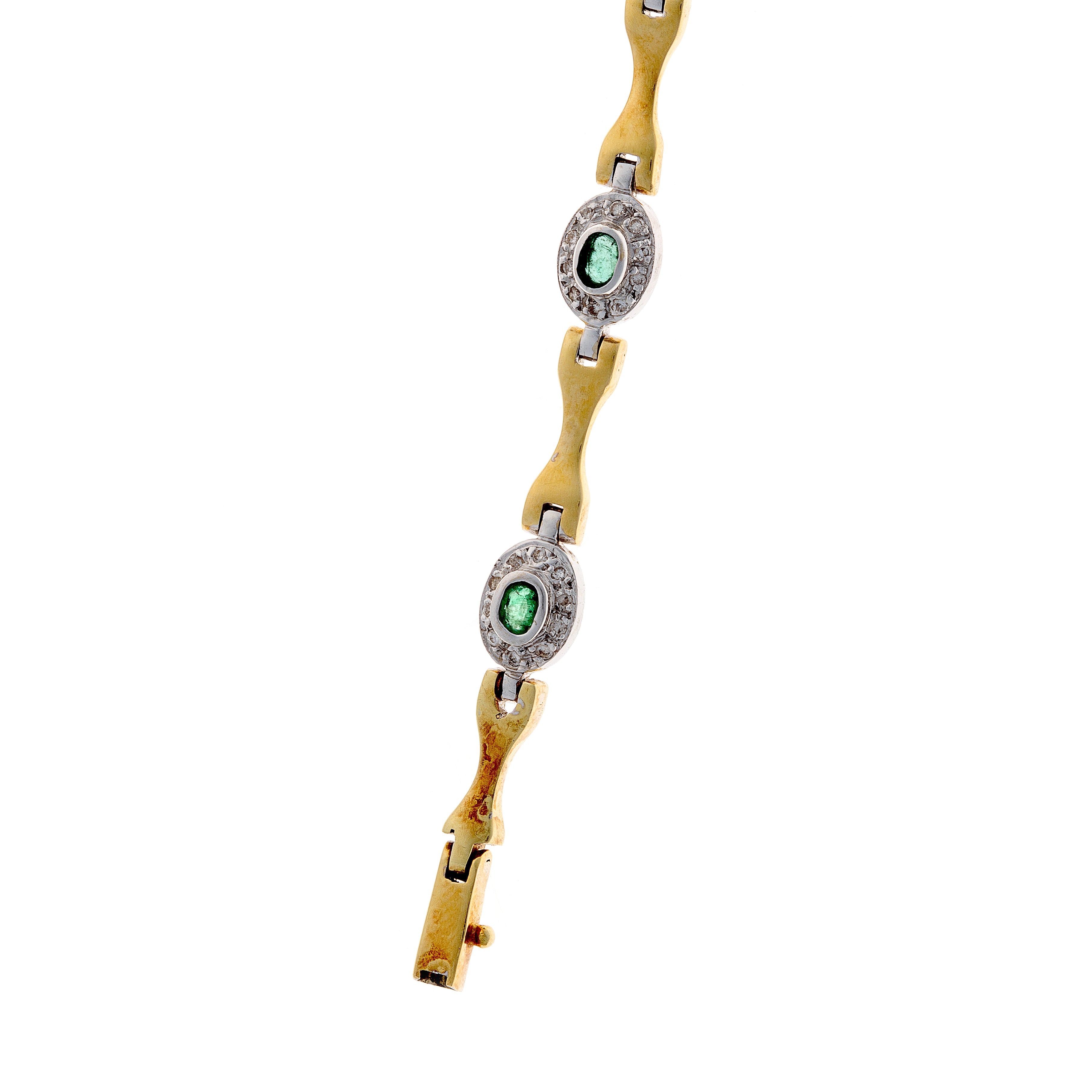White and yellow gold link bracelet with cabochon emeralds and subtle diamond accents